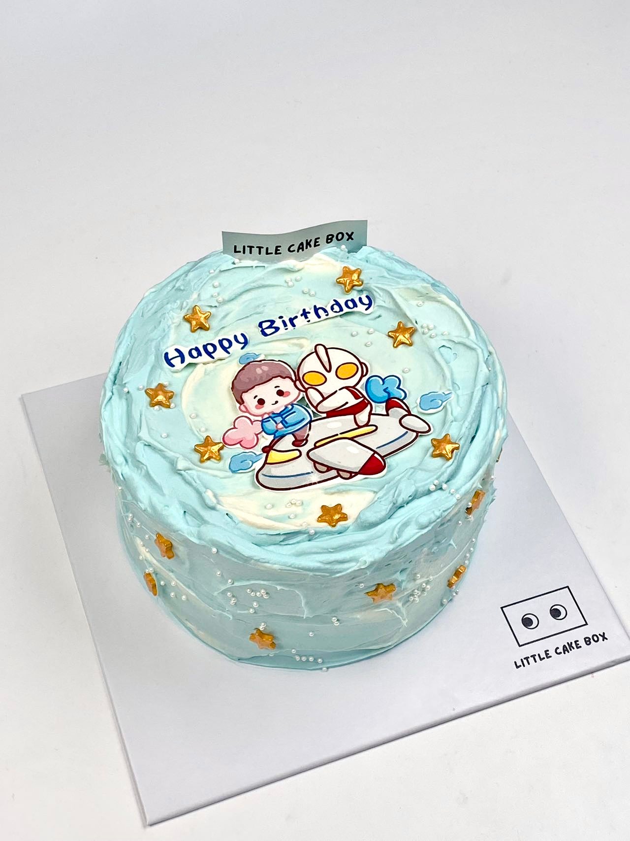 Ultraman in a Plane Cake