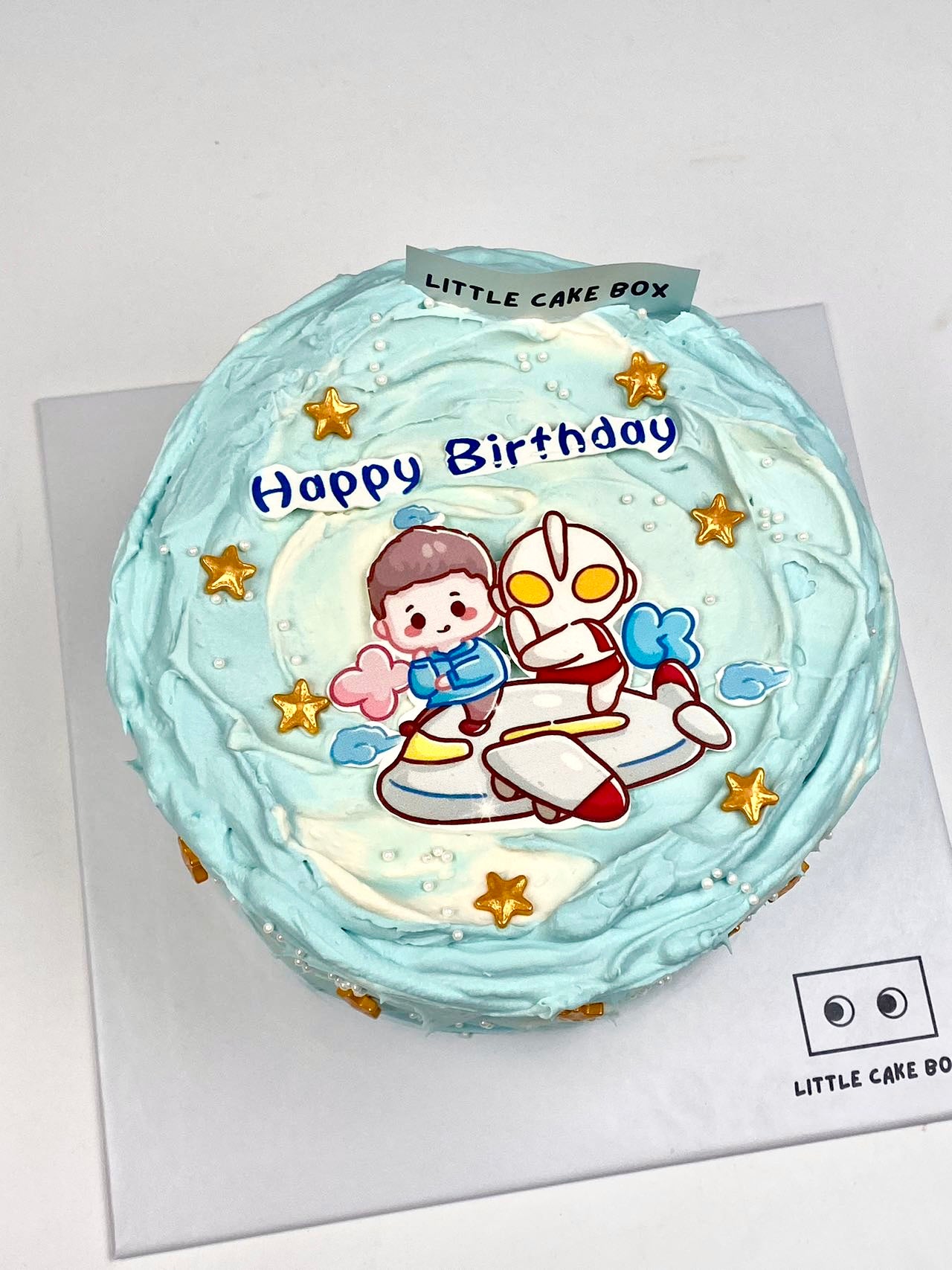 Ultraman in a Plane Cake